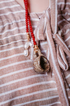 Collar café con espumita